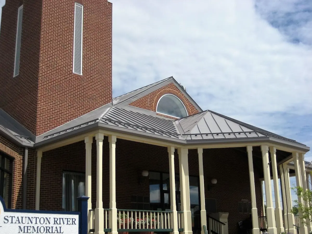 Skilled roofing craftsmen working on a residential roof in Tremont City